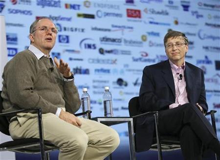Microsoft Chairman Bill Gates listens to Chief Research and Strategy Officer Craig Mundie at RSA Conference